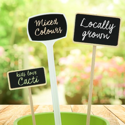 Ground stake sign holders and plant labels with write-on heads
