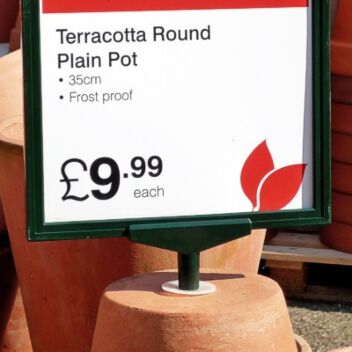 A4 landscape sign fixed to an upturned plant pot