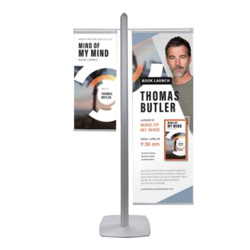 Free-standing display system with banner arms