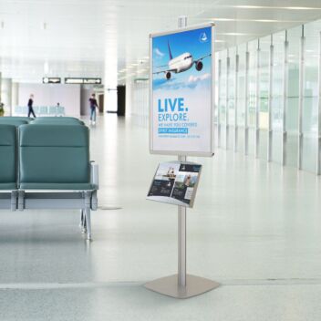 Poster and brochure holder in an airport advertising travel insurance
