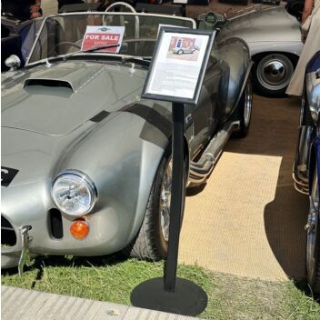 Curved A4 floor sign used at an outdoor event