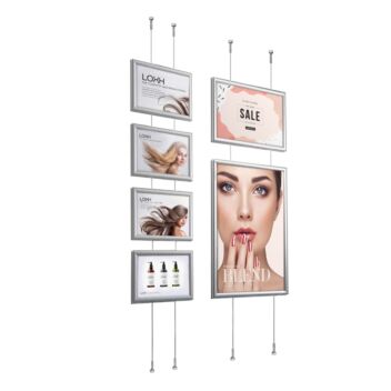 Combining landscape and portrait frames on floor-to-ceiling wires