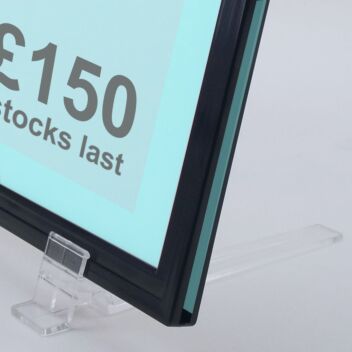 Tabletop plastic sign holder with angled feet