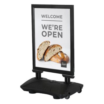 Black weatherproof pavement sign with wheels